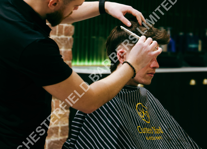 man getting a mullet haircut